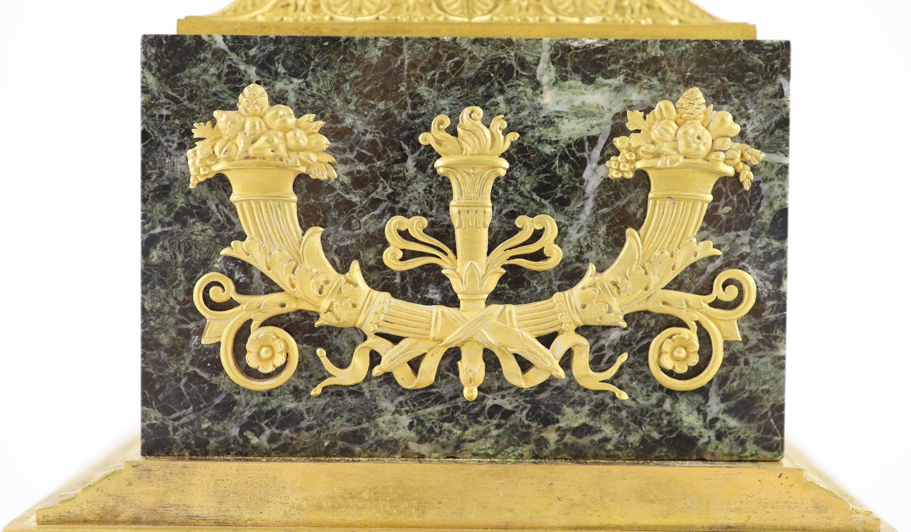 A 19th-century French ormolu and marble lyre shaped mantel clock H 52cm. W 18cm. D 12cm.